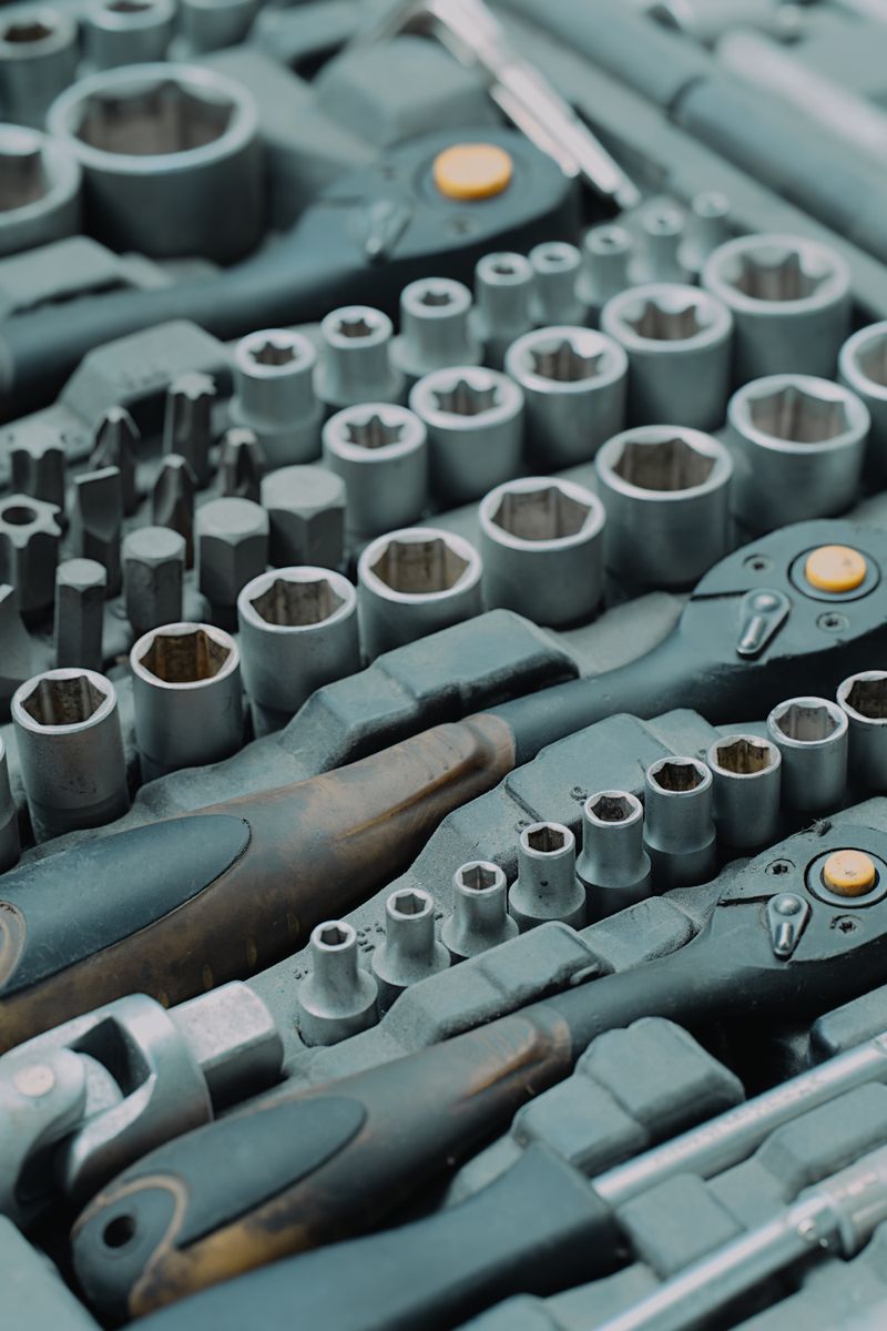 Rows of socket heads laid out in a tool tray